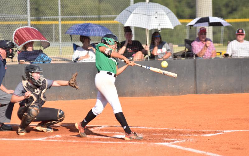 Jayden Gailey gets one of her hits during Wednesday's game against Jackson County.