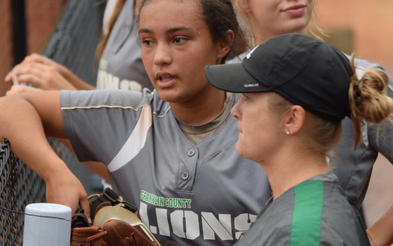 Sophomore Jayden Gailey talks with Franklin County Lady Lion assistant softball coach Cherokee Bell. Gailey has been named Class AAA State Player of the Year for the second year in a row.