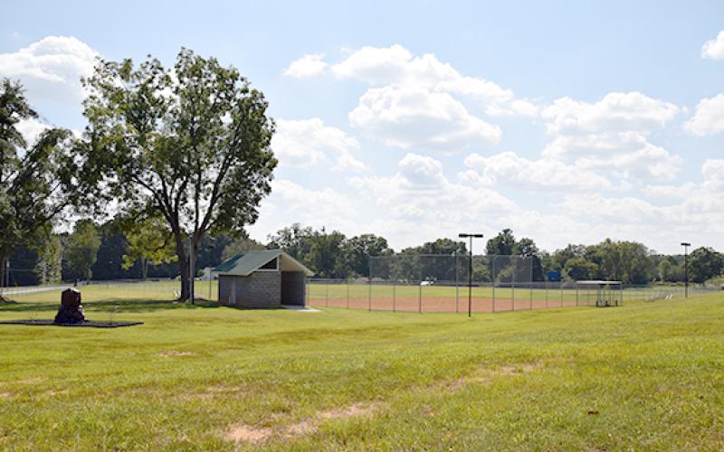 The ballfield is on Fowler Street, near the city park and just behind Morgan’s Used Cars.
