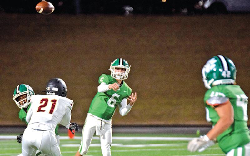 The Franklin County Lions moved to freshman Mason Davis at quarterback during Friday’s game with Hebron Christian in order to begin giving Davis experience for future seasons. (Photo by Scoggins)
