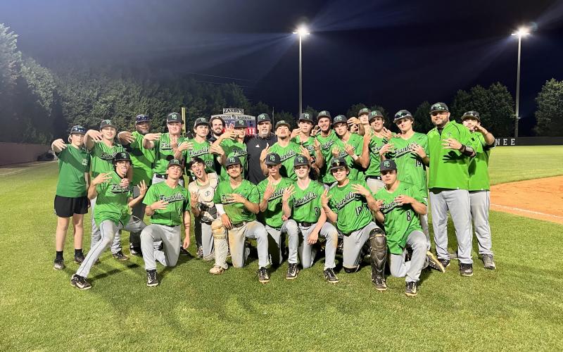 The Franklin County Lions baseball team secured their third-straight Region 8AAA championship with a sweep of Oconee County last week in Watkinsville. The Lions will host a state playoff series Monday. For complete details, see Page 9. (Photo courtesy of Christy Dodd)