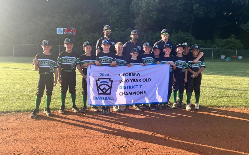 Members of the District 7 Champion 8-10 year old Franklin County Little League All Star team are Brooks McGee, Easton Jones, Knox Richardson, Caden Freeman, Aydan Threlkeld, Kysen Dove, Boston Kilgore, Rylen Haley, Max Westbrook, Tyson Fuller, Cason Pardue and Cooper Pardue. The team is coached by Kris Dove, Myca Richardson, Justin Freeman and Bruce McGee. (Photo courtesy of Franklin County Little League)