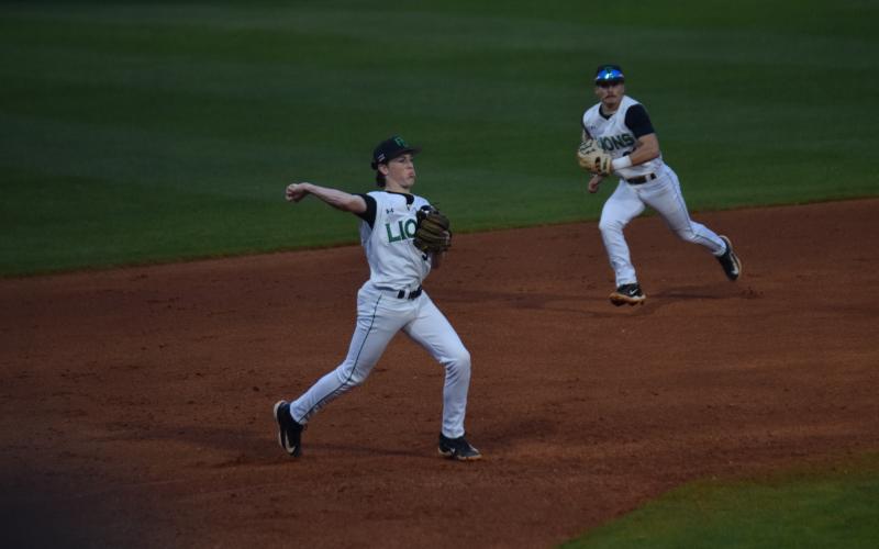Luke Beasley makes a throw from third in action earlier this season.