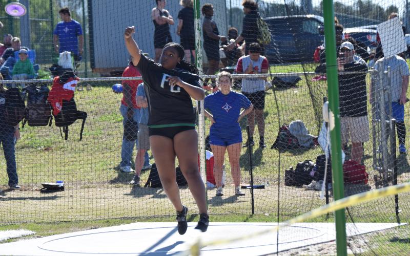 Among the first-place finishers for Franklin County at the John Scott Hartness Invitational were Saniya Heard in the shot put.