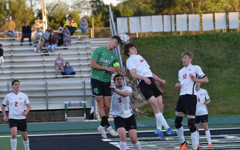 Lion Max Bridges goes up for a header during action Friday at Jeff Davis Field at Ed Bryant Stadium in a win over Stephens County to clinch a state playoff spot. (Photo by Scoggins)