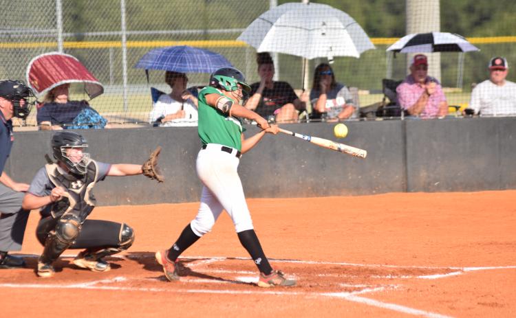 Jayden Gailey gets one of her hits during Wednesday's game against Jackson County.