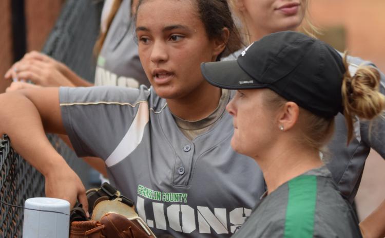 Sophomore Jayden Gailey talks with Franklin County Lady Lion assistant softball coach Cherokee Bell. Gailey has been named Class AAA State Player of the Year for the second year in a row.