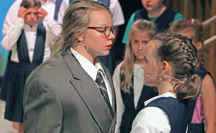 Matilda (Brooke Tate, right) stands up to Agatha Trunchbull (Alice Tanner, left) in a scene from Franklin Community Players’ Youth Summer Theatre camp’s production of “Matilda Jr.,” which opens this weekend. (Photo courtesy of Amy Burns)