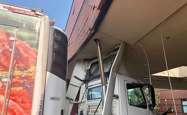 A food delivery truck took a wrong turn Friday morning, and got stuck in the entryway at Franklin County Middle School. (Photos courtesy of Franklin County School System)