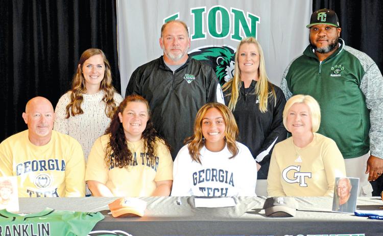 Jayden Gailey signed last week to play softball for Georgia Tech. Pictured at her signing ceremony are (front, from left) grandfather Randall Gailey, mom Haden Gailey Stephens, Jayden, grandmother Lane Gailey, (back) Franklin County High School softball coaching staff Mackenzie Burns, Head Coach Jason Oliver, Cherokee Bell and Demond Rivers. (Photos by Scoggins)