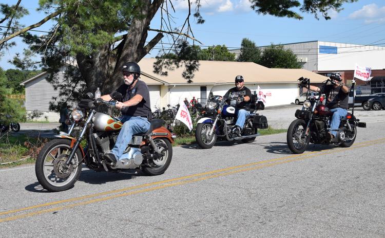 About 30 motorcycles left the VFW Post 5897 for a ride through the county in support of Toys for Tots Saturday. (Photo by Sinclair)