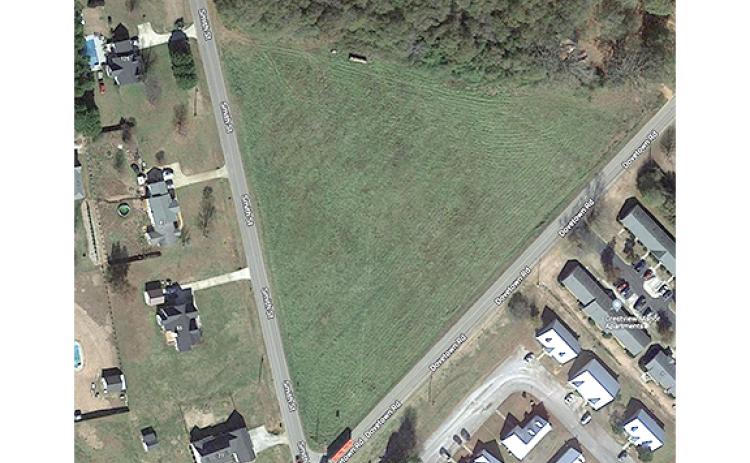 The Royston City Council rezoned a triangle-shaped piece of property at the corner of Smith Street and Dovetown Road Tuesday to R-2 residential.
