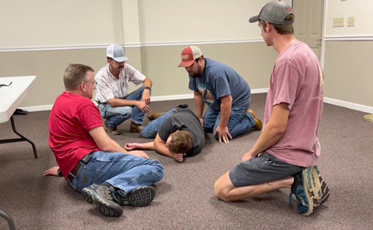 Members of the Carnesville, Red Hill and Five Area fire departments recently went through TC3 training to learn to treat patients in a hostile environment, like a school shooting.