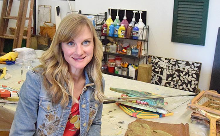 Ammo Johnson teaches art classes in the back studio next door to Sweet Combs of Honey. (Photo by Sinclair)