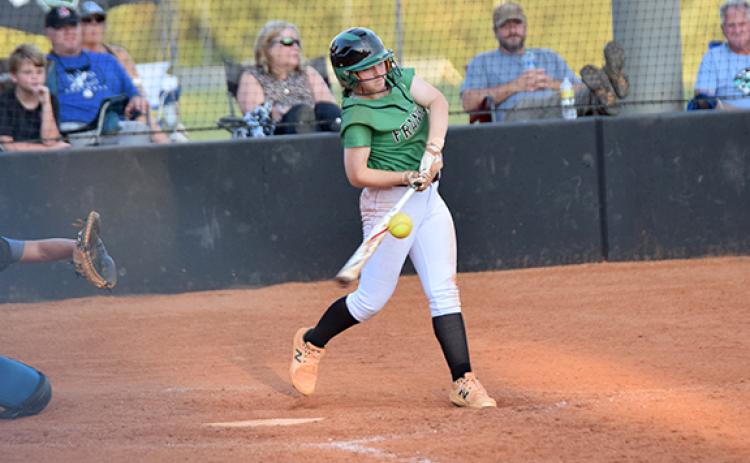 Hayden McGee and her fellow Lady Lions earned a spot in the state playoffs by winning the Region 8AAA regular season championship with a 9-1 record. (Photo by Scoggins)