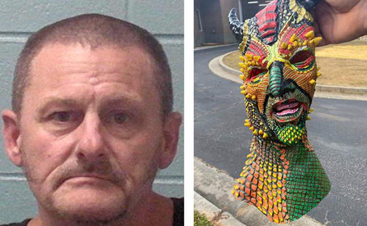 Daryl Keith Davis, 58, of Martin was charged with disruption or interference with the operation of a public school. He allegedly was wearing a full-hooded devil mask that law enforcement seized as evidence.