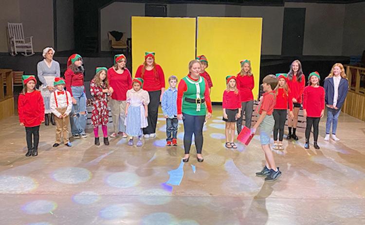 The cast performs a scene from “A Fairy Tale Christmas Carol,” which opens Nov. 18 at the Lavonia Cultural Center.