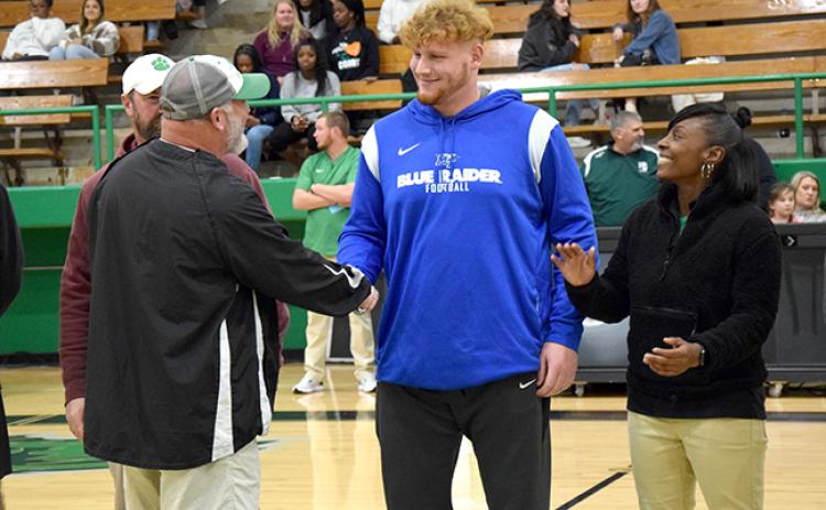 Former Franklin County Lion Keylan “Red” Rutledge received his state shot put championship ring in a ceremony Thursday in the Lion’s Den. Rutledge won the Class AAA state shot put title in May with a throw of 53’4” on his last attempt. The throw was 2’5” farther than Rutledge had ever thrown. Rutledge, who was also a standout football and basketball player for the Lions, is now a starting offensive lineman for Middle Tennessee State University, where he was named to the C-USA All-Freshman Team.