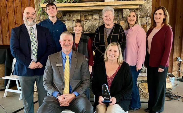 The late Chris Forrer's family and members of the Franklin County School System attended an awards ceremony last week where Forrer was posthumously awarded the Pioneer in Education Award by Pioneer RESA.