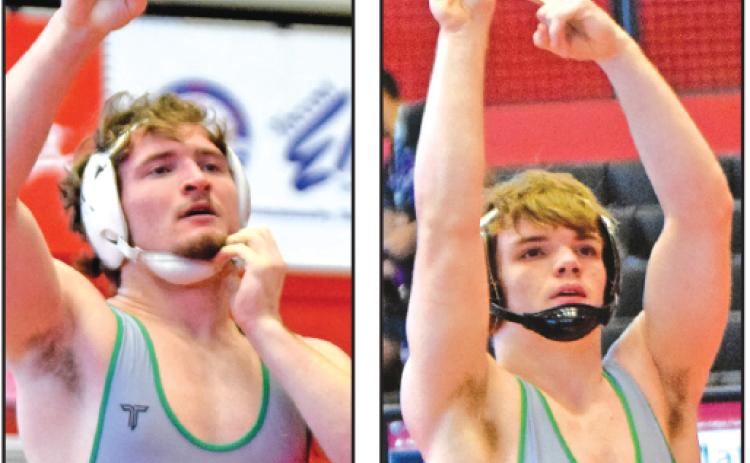 Brady Simms (left) and Jacob Baughcum (right), pictured at the area tournament, each finished as state runners-up in their weight classes Saturday at the State Traditional Wrestling Tournament in Macon.