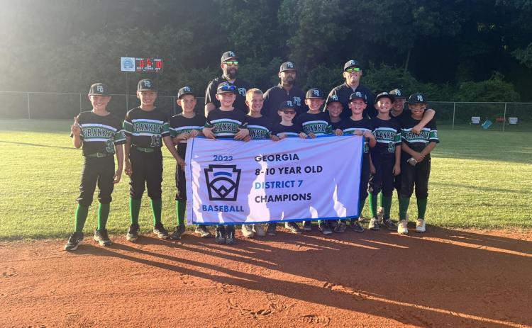 Members of the District 7 Champion 8-10 year old Franklin County Little League All Star team are Brooks McGee, Easton Jones, Knox Richardson, Caden Freeman, Aydan Threlkeld, Kysen Dove, Boston Kilgore, Rylen Haley, Max Westbrook, Tyson Fuller, Cason Pardue and Cooper Pardue. The team is coached by Kris Dove, Myca Richardson, Justin Freeman and Bruce McGee. (Photo courtesy of Franklin County Little League)