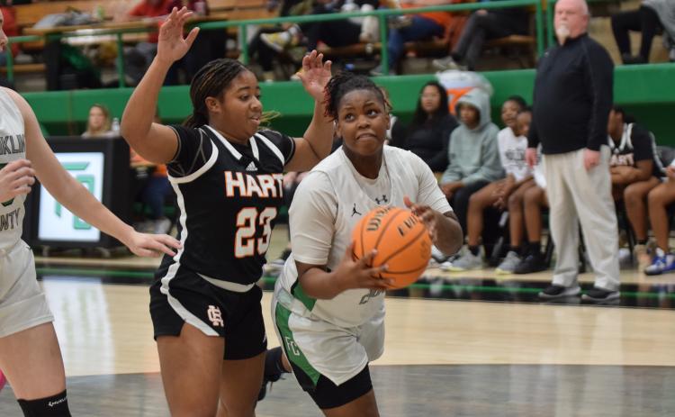 Emiyah Strange drives past a Hart defeander and looks for a shot in the Lady Lion’s final home game of the regular season Friday. (Photos by Scoggins)