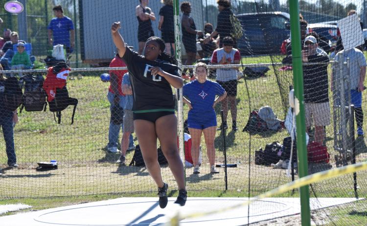 Among the first-place finishers for Franklin County at the John Scott Hartness Invitational were Saniya Heard in the shot put.