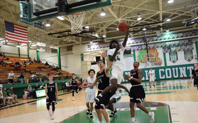 Micah Roebuck takes an acrobatic shot earlier this season against Jackson County.