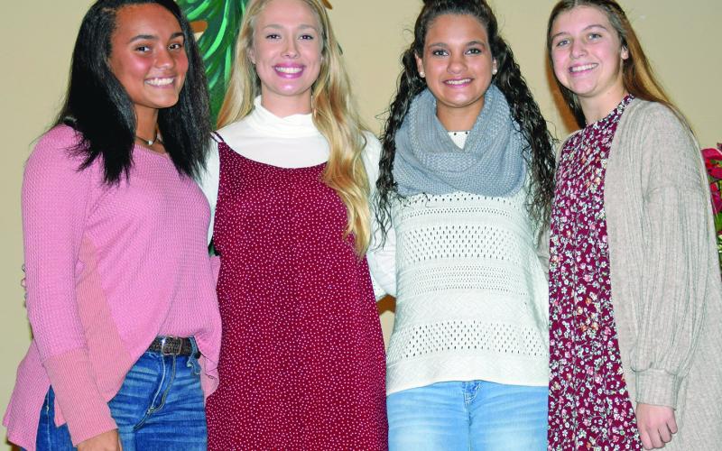 Members of the state champion Franklin County Lady Lions named to All-State teams are (left photo, from left) Jayden Gailey, named State Player of the Year by both the Georgia Athletic Coaches Association (GACA) and the Georgia Dugout Club; Jaden Cheek, second-team All-State by the GACA; Peyton Rivers, first-team All State by the GACA; and Ellee Varner, second-team All-State by the GACA.