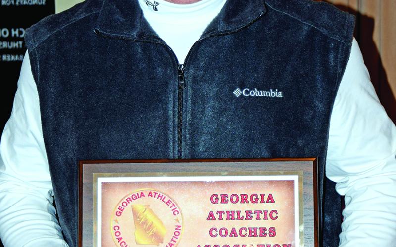 Coach Jason Oliver (right photo) was named State Coach of the Year by both the GACA and Dugout Club.