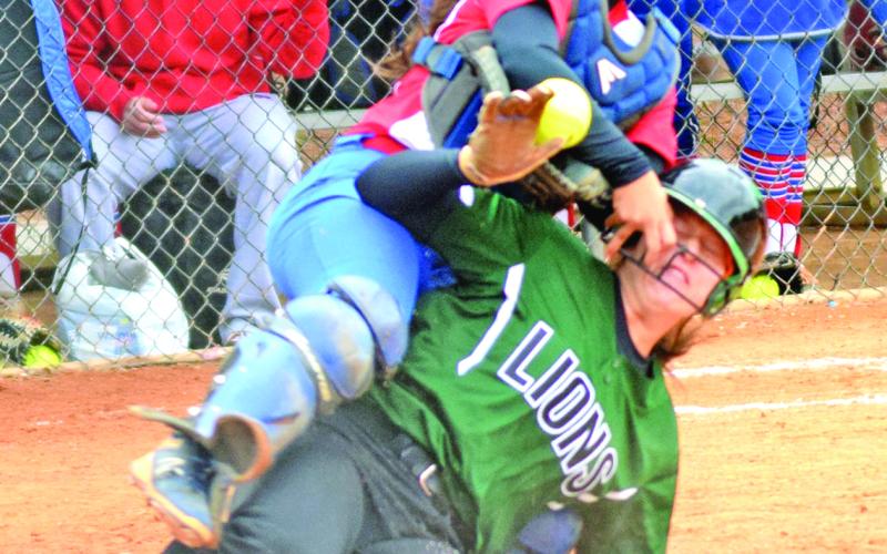 Seniors Kalyn Jinks (sliding in safely during last year's state semifinals), Kaleigh Fowler and Jaden Cheek will be counted on for leadership as the Franklin County Lady Lions set out to defend their Class AAA state championship.
