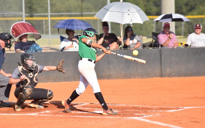 Jayden Gailey gets one of her hits during Wednesday's game against Jackson County.