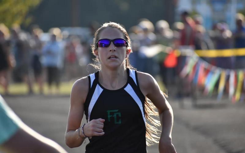 Middle school cross country region champion Ansley Moore