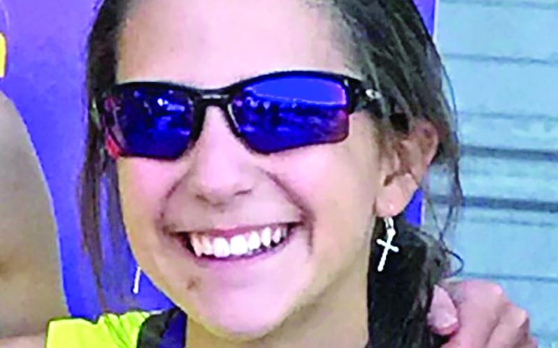 Ansley Moore gave up a top finish Saturday to help a competitor.