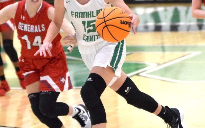 Lady Lion Emily Carson drives into the lane during action Friday in the Bearden Border Wars tournament at FCHS.