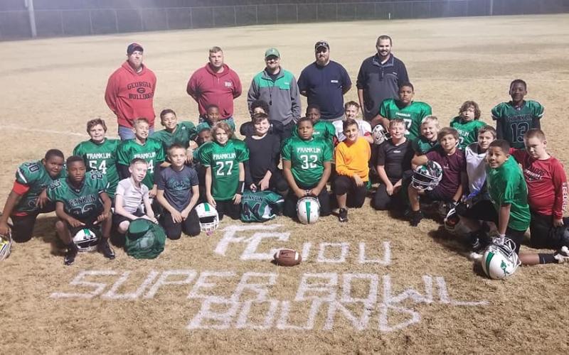 Franklin County Lions 10-and-Under team members are Kolson Howell, Gavin Wells, Aiden Westmoreland, Essien Lockleer, Josh Baughcum, Kade Gentry, Kewonta Riley, Hunter Barnes, C.J. Davis, Rayan Wilson, Kennan Burtch, Jeromyah Knox, Janareon Riley, Carson Cheek, Colton Milsaps, Blake Abercrombie, Kendaus Burtch, Josiah Jackson, Sihon Wigfall, Myles Kelley, Gage Bryant, Hunter Blackmon, Crate Phillips, Connor Fuhrman, Eli Bridges and Alijah Kibler.  Coaches are Jeremy Barnes, Brian Scott, Aaron Kibler, Brent H