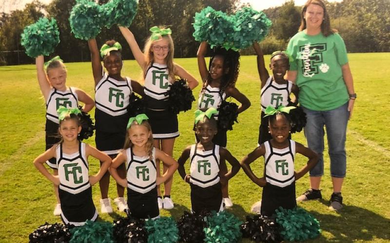 Cheerleaders for the Franklin County 10-and-Under team are Tatum Kibler, Jacey Barnes, Kara Howell, Adalin Waddell, Shaniyah Oglesby, Aaliyah Lockleer, Indiria Lockleer, Legacie Johnson and Ja’Leah Key, led by coaches Felicia Howell, Brittainy Barnes and Shanya Kibler.