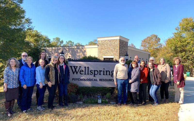 Wellsprings Psychological Resources staff members are (front, from left) Laura Huddleston, Amy Swails, Rebecca Stinson, Beverly Oxley, Mara Davis, Harold Rhoades, Tammy Arnold, Charity Parker, Cortney Puntervold, (back) Terry Morris, Elizabeth Gilchrest, Christopher Caldwell, Danny Bird, Noreen Braswell, Andeena Oxley and Tina Hart. Not pictured are  Megan Al-Chacar and Wanda Heath.