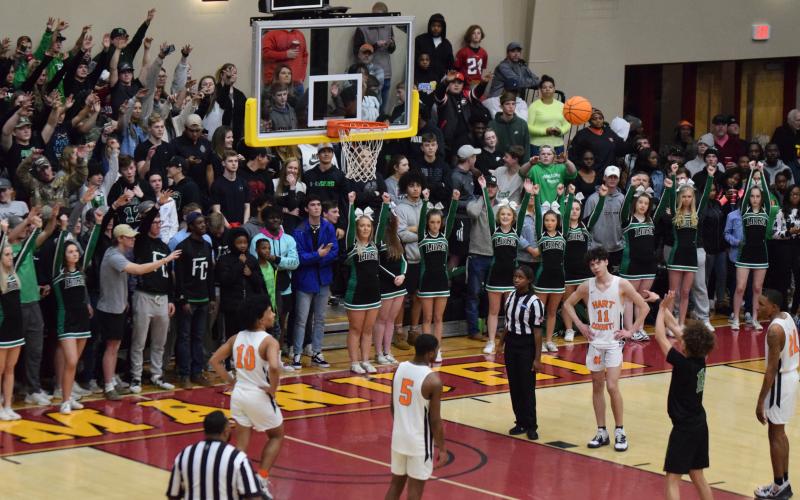 Titus Brown shoots a free throw during Franklin County's 70-65 win over Hart County Friday in the Region 8AAA Tournament semifinals.