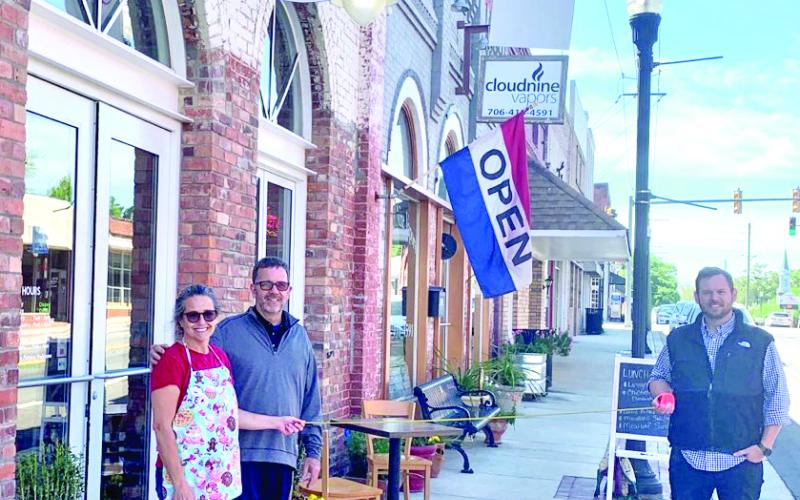 Ryan Swails (right in both photos) of the Swails Agency of Country Financial in Royston has donated $750 each to Bebop’s Bakery (left, owned by Tracy and John McLean) and The Old Corner Hardware Store (right, owned by Kelley Tamplin).