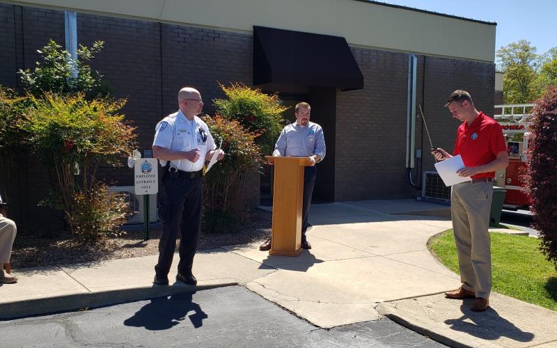 The Lavonia City Council met outside Friday at City Hall to declare a state of emergency so that local police can enforce Gov. Brian Kemp's shelter-in-place order.