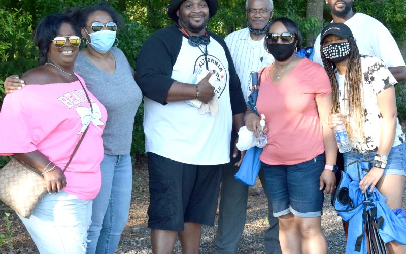 Members of the community and city leaders gathered Friday at the Royston Wellness and Community Park to hear speakers speak about racism and law enforcement. (Photo by Scoggins)