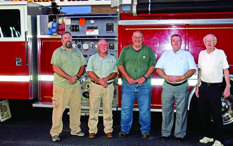 Former Lavonia Fire Chiefs gathered Tuesday to honor the retiring Scott O'Barr. Pictured are (from left) O’Barr, Bob White, Jones Beasley, Mike O’Barr and Tommy Cole. (Photo by Scoggins)