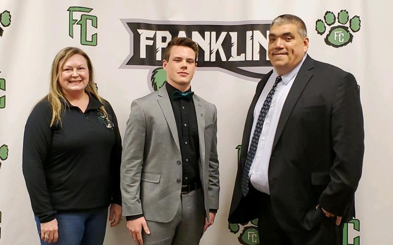 Franklin County High School senior Simon Burger (center) – pictured with Beta Sponsor Cheryl Medlin (left) and Franklin County School Superintendent Chris Forrer – has received an appointment to the U.S. Naval Academy in Annapolis, Md.
