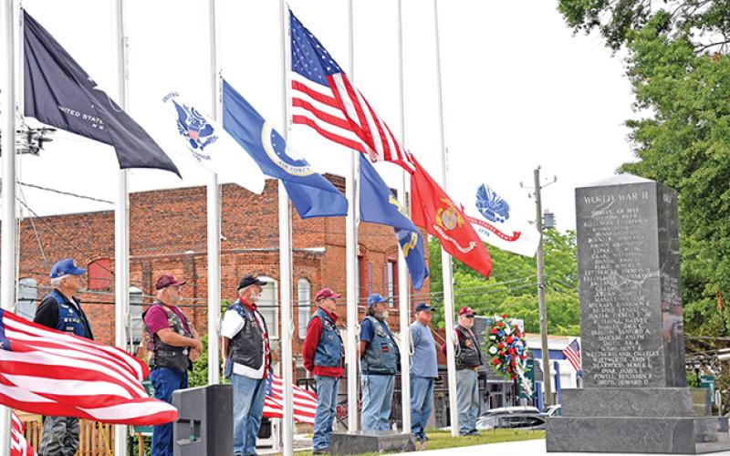 The Memorial Day service was decorated with U.S. flags posted by Richard Roberts of the Patriot Guard Riders, who also participated in the ceremony.