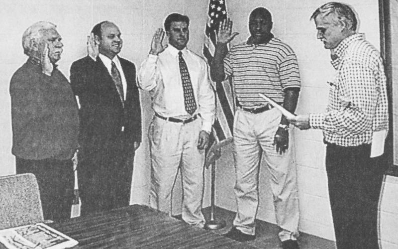 In this photo, first published in the Jan. 6, 2000, issue of The News Leader, David Jordan (second from left) and Keith Turman (second from right) are sworn in as new members of the Royston City Council by then-Mayor Steve Williams (right), along with Paul Crawford (left) and Greg Gurley (center). Turman was the only person to qualify to run for mayor of Royston in November. Current Mayor Jordan decided not to run.