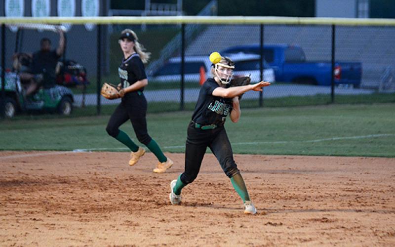 Journey Roberts makes a throw to first base during Franklin County’s home game with Habersham Central Monday in Carnesville. (Photo by Scoggins)