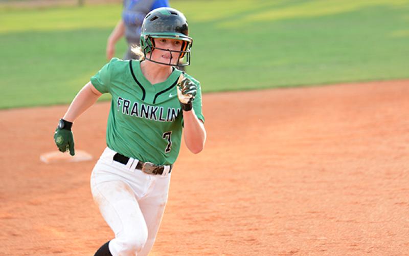 Journey Roberts heads to third during action Tuesday against Banks County at Franklin County High School. Roberts, a junior, is the only non-senior in the starting lineup for the Lady Lions. (Photo by Scoggins)