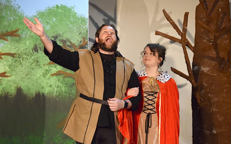 King Arthur (Josh Bryan) shares the magic of Camelot with Guenevere (Jamee Floyd) in the title number. (Photo by Sinclair)