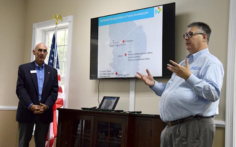 With Moderator Rope Roberts looking on, Development Authority of Walton County Director Shane Short shares that “the golden opportunity” for growth is between the I-20 and I-85 corridors. (Photo by Sinclair)